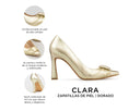 Clara - Zapatillas de Piel Doradas, infografía